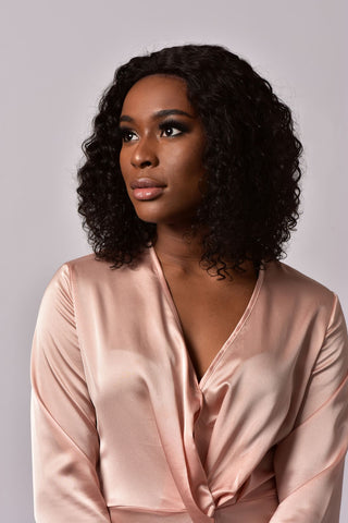 SLEEK VIRGIN GOLD LEAH SHORT LOOSE WAVY BOB WIG Virgin Brazilian human hair.   A rounded bob style, with a natural tiny curl pattern. With a lace front, lace parting and baby hair.  For natural UK black women. Available now from the Kinky Wigs store- the best online source for natural looking wigs, weaves, ponytails, clip in extensions and crochet braids. cheap lace wigs